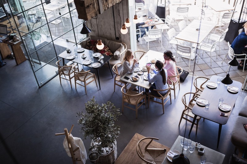 top view of restaurant dining area with people